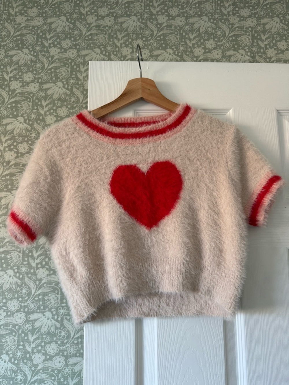Cozy Cream Crewneck Sweater with Red Heart Detail